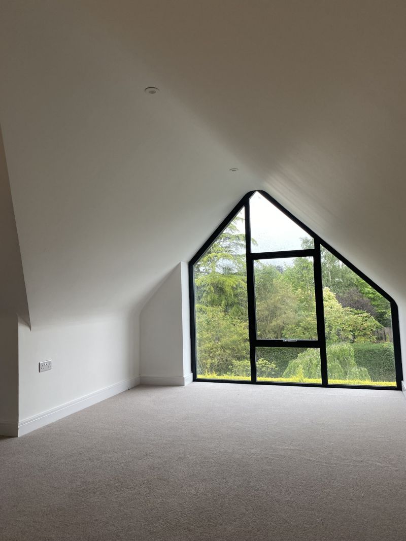 Plastering - New build, Derbyshire. Sloping soffits: Swipe To View More Images
