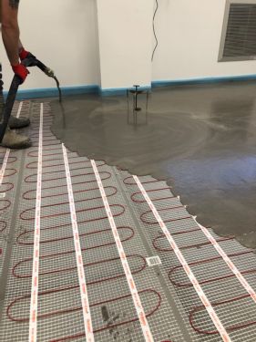 Click Here To Enlarge This Photo Of Levelling Screed Over Underfloor Heating