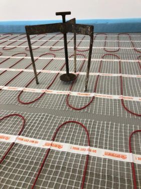 Click Here To Enlarge This Photo Of Levelling Screed Over Underfloor Heating
